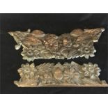 A pair of French oak carvings