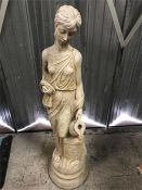 A Garden statue of a Roman goddess with an amphora, 102cm x 30cm.