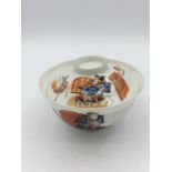 A Japanese eggshell porcelain tea bowl