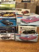 Seven model car kits, various makers