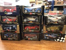 A selection of die cast car models, eleven in total, mostly by Burago