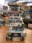 A selection of ten model kits for motorbikes and cars