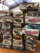 Twenty-two American car model kits