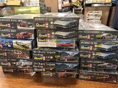 Seventeen assorted Revell model kits for cars