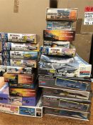 A selection of twenty one military airplane models by makers including Monogram, Revell, Matchbox