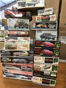 A selection of twenty model cars.