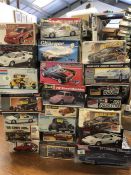 Twenty two assorted car model kits