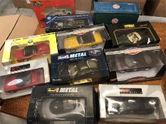 A large volume of die cast toys by a variety of Revell, Corgi, American Muscle, eleven in total