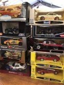A selection of ten larger style die cast models of cars by a variety of makers