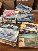 A selection of military plane models by a variety of makers to include Hales, Hasegawa, forty six in