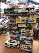 A selection of eighteen various car model kits from various makers