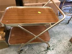 A collapsible tea trolley