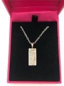 A 14ct white gold diamond pendant necklace