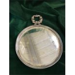 A silver handled ladies vanity mirror