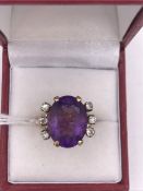 An 18ct yellow gold substantial Amethyst and Diamond ring