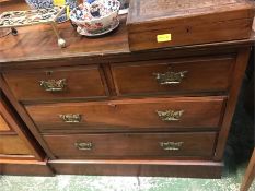 A Two over two drawer chest of drawers