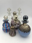 A selection of scent bottles, various styles.