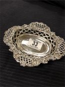 A silver pin dish, hallmarked Birmingham 1904.