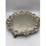 An Edinburgh Hallmarked three footed silver tray, 745g.