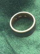 A gold ring marked 750