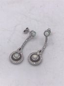 A pair of silver CZ and Opal panelled Art Deco style drop earrings