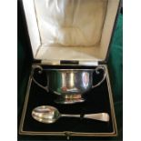 A cased silver Christening set, makers mark BBS ltd, Birmingham 1927, porridger and spoon.