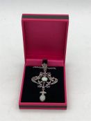 A Silver Art Deco style pendant necklace set with marcasite's rubies and opals