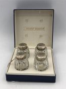 Boxed set of four silver and crystal salt and peppers