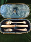 A boxed hallmarked Sheffield 1886,makers mark RMEH Christening set.