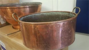 Two copper planters