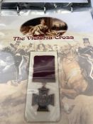 A Danbury Mint collectors folder celebrating the Victoria Cross