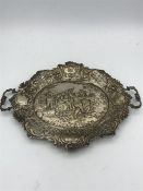 An ornate silver tray, marked 800