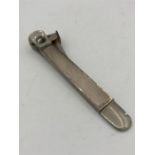 A machine tooled MW & Co ltd silver cigar cutter