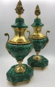 A pair late 19th Century French Bronze marble covered in Machalite Urn appear to have been