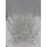 Four large Arundel wine glasses and six Stuart flutes c.1930