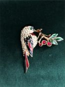 A large parrot brooch