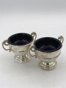 Two Sheffield hallmarked 1900 cruets with blue glass liners by James Deakin and Sons