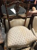 An ornate padded bedroom chair