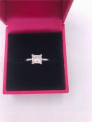 An 18ct white gold princess cut diamond ring