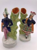 A Pair of Staffordshire spill vases