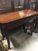 A mahogany tea table with inlay.