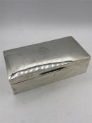 A silver cigarette box by Page Keen & Page, hallmarked London 1941.