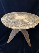 Two carved tables,