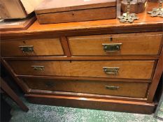 A Two over two drawer chest of drawers