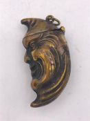 A Brass Vesta Case in the form of a half moon