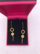 A pair of 14ct yellow gold citrine and garnet drop earrings