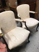 A Pair of cream chairs