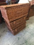 A selection of five wicker picnic baskets.