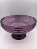 An amethyst wave studio glass bowl.