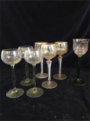 A collection of seven 60's style wine glasses
